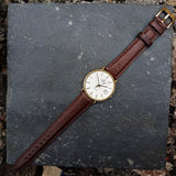 A beautiful yet classic vintage mens watch by Marvin with a supple brown leather strap
