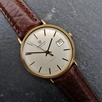 A beautiful yet classic vintage mens watch by Marvin with a supple brown leather strap