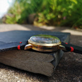Case on Vintage 1950s Cimier Sport Gold Mechanical Chronograph with Black Leather Strap with Red Stitching 